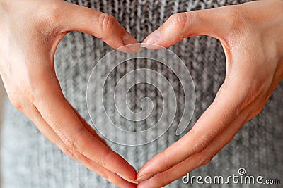 The concept of love and health. Girl hands made form of hearts Stock Photo