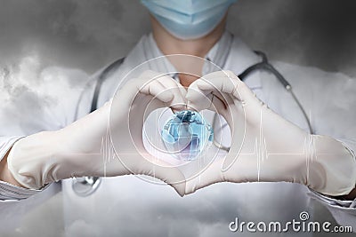 Concept of love and protection of the world by healthcare professionals Stock Photo
