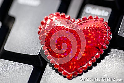 Big red heart on the keyboard. Stock Photo