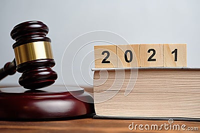 The concept of new laws in 2021 next to the judge hammer Stock Photo