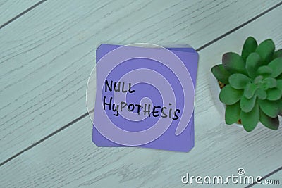 Concept of Null Hypothesis write on sticky notes isolated on Wooden Table Stock Photo