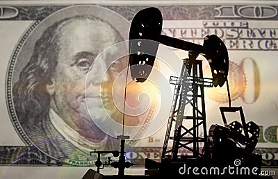 Concept oil and dollar. Installation for drilling a pump oil against a background of one hundred dollars a banknote, money Stock Photo