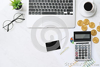 Concept of online payment with credit card with smart phone, laptop computer on office desk on clean bright marble table Editorial Stock Photo