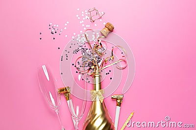 Concept of opening an expensive golden champagne bottle dedicated to the celebration Stock Photo