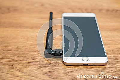 Concept phone with a small antenna Stock Photo