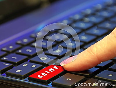 Danger online internet dark web hate crime victim user finger pressing pushing red button computer Stock Photo