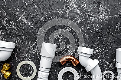 Concept plumbing work top view on dark background Stock Photo