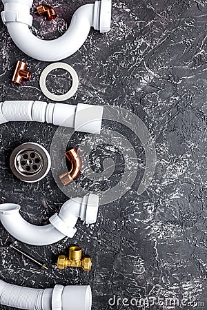 Concept plumbing work top view on dark background Stock Photo