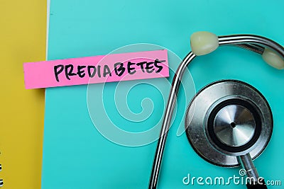 Concept of Prediabetes write on sticky notes with stethoscope isolated on Wooden Table Stock Photo