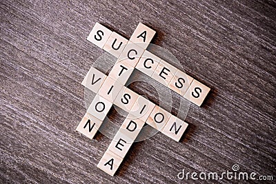 Concept presented by crossword with words idea, vision, action a Stock Photo