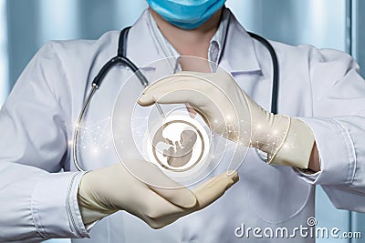 Concept of protection of medical and support human embryo Stock Photo