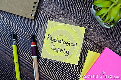 Concept of Psychological Safety write on sticky notes isolated on Wooden Table Stock Photo