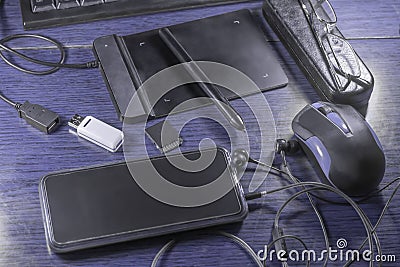 The concept of purple desktop color. Mobile phone template, colored laptop and glasses Stock Photo