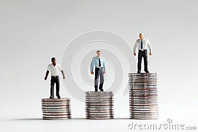 The concept of racial wage disparity. Stock Photo