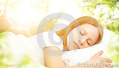 concept of rest and relaxation. woman sleeping in bed on the background of nature Stock Photo