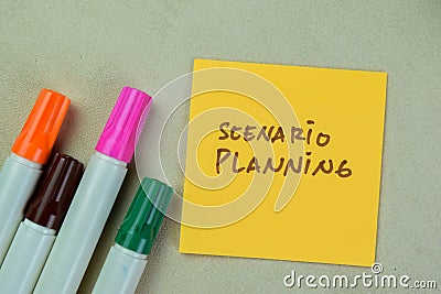 Concept of Scenario Planning write on sticky notes isolated on Wooden Table Stock Photo