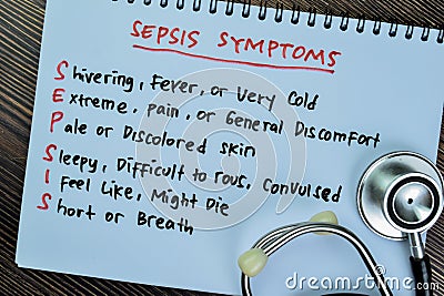 Concept of Sepsis Symptoms write on book isolated on Wooden Table Stock Photo