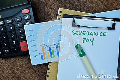 Concept of Severance Pay write on paperwork isolated on Wooden Table Stock Photo