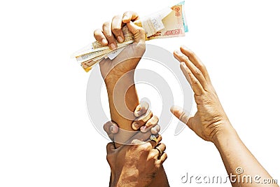 Concept showing of Greed for money, Hands trying to grab money from another person hands Stock Photo