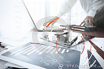Concept of target focus digital diagram,graph interfaces,virtual UI screen,connections netwoork.Hipster finance analyst working Stock Photo