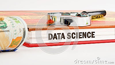 The concept of technology and development. Phrase, words, text DATA SCIENCE on the end of the book, front view Stock Photo