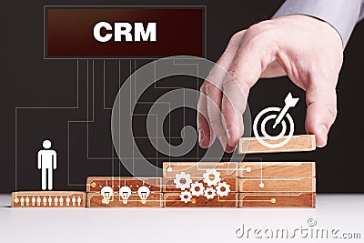 The concept of technology, the Internet and the network. Businessman shows a working model of business: CRM Stock Photo