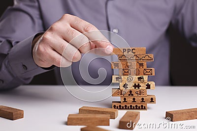 The concept of technology, the Internet and the network. Businessman shows a working model of business: PPC Stock Photo