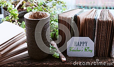 Concept to celebration Nov 20, kraft paper notebook, Happy teachers day message Stock Photo