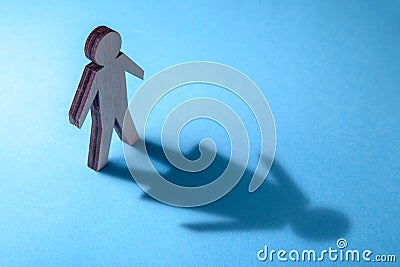 The concept of transvestite or bisexual. Tranender, man feels like woman. Shadow of man in the shape of woman Stock Photo