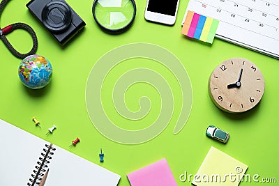 Concept of travel vacation trip planning on green background Stock Photo