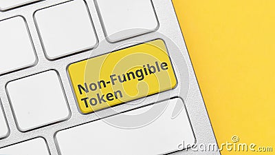 Concept type of cryptographic non-fungible tokens on the keyboard button Stock Photo