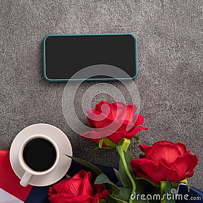 Concept of Independence day or Memorial day with smart phone and coffee. Flag over dark gray table background Stock Photo