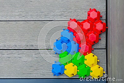 The concept of a united group is a multitude of different hexagons, connected and inextricably linked with each other Stock Photo