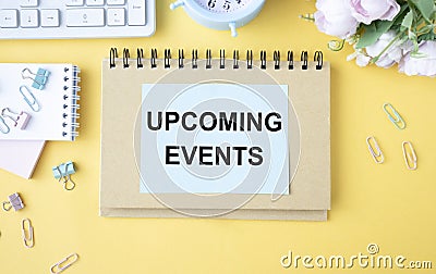 Concept Upcoming Events message on notebook Stock Photo