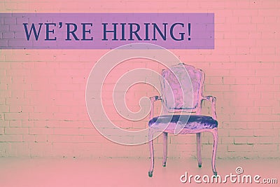 Concept of vacant chair. Vintage chair against brick wall. We are hiring retro design template Stock Photo