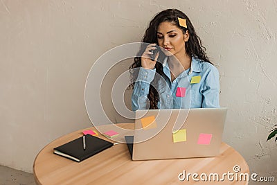 Concept of versatility and multitasking, young woman works laptop, all in stickers Stock Photo