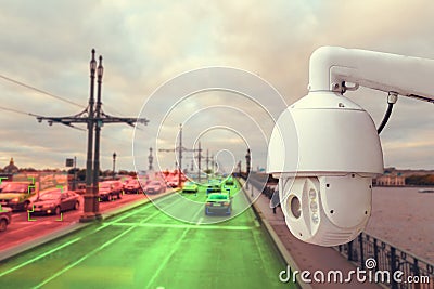 The concept of video surveillance and security technology. A surveillance camera monitors the violators of traffic rules. In the Stock Photo