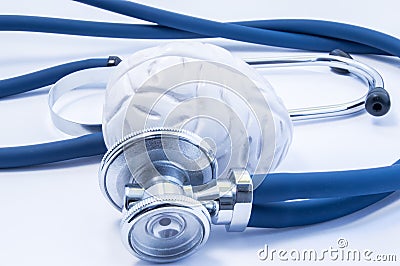 Concept of visualization or imaging diagnosis and treatment of diseases of brain using brain model and stethoscope, which like exa Stock Photo