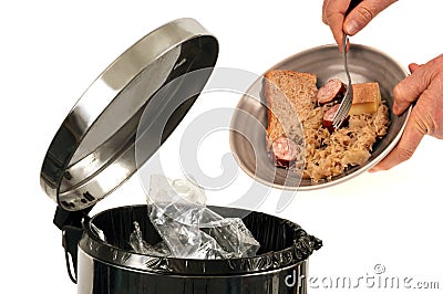 Throw food in the trash Stock Photo