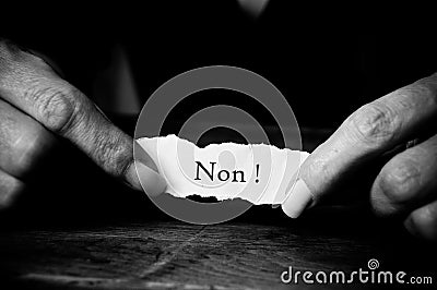 Concept woman with message in hands - Non ! Stock Photo