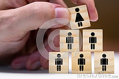 Women in leadership positions or promotion as a woman Stock Photo