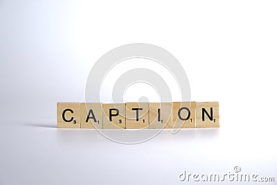 concept word caption on cubes on a beautiful white background background Stock Photo