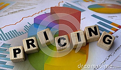 Concept word pricing on cubes against the background of the graph Stock Photo