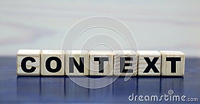 Concept words context on cubes on a wooden background Stock Photo