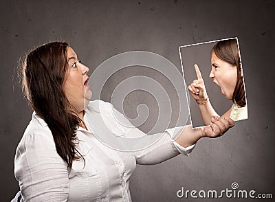 Concept of young girl telling off a woman Stock Photo