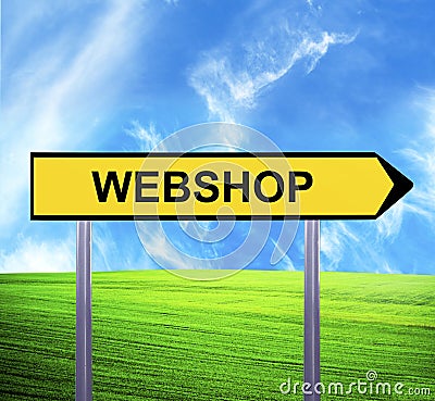 Conceptual arrow sign against beautiful landscape with text - WEBSHOP Stock Photo