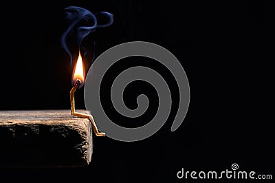 Conceptual burned out wooden matches on black background Stock Photo