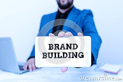 Conceptual caption Brand Building. Business showcase boosting customer s is knowledge over a certain business Tech Guru Stock Photo