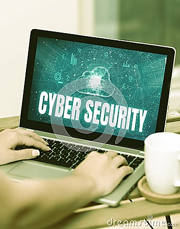 Conceptual caption Cyber Security. Concept meaning Protect a computer system against unauthorized access Both Hands Stock Photo