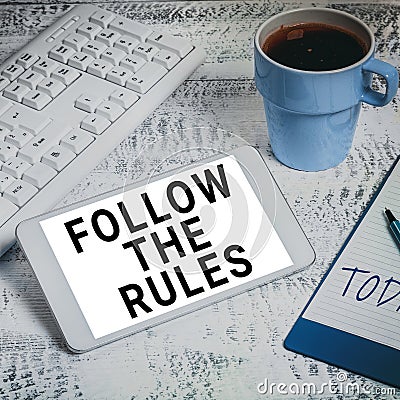 Conceptual caption Follow The Rules. Business overview learn to conform the compliance, regulations, or guidelines Stock Photo